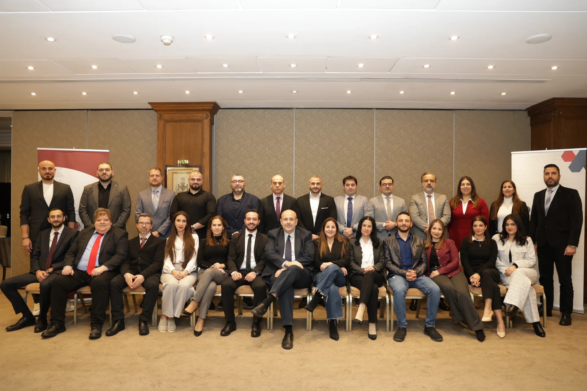 Headway program participants posing together in a conference room
